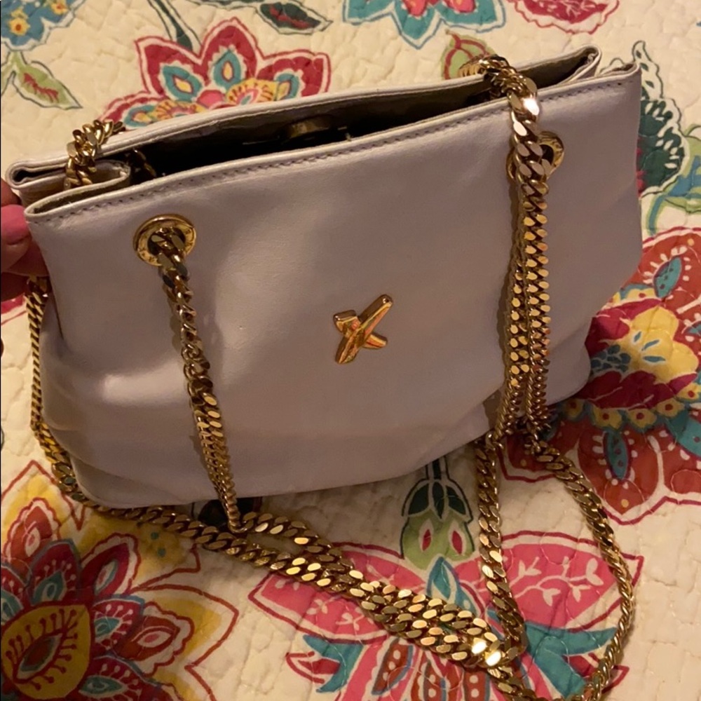 Paloma neigh cross hand bag